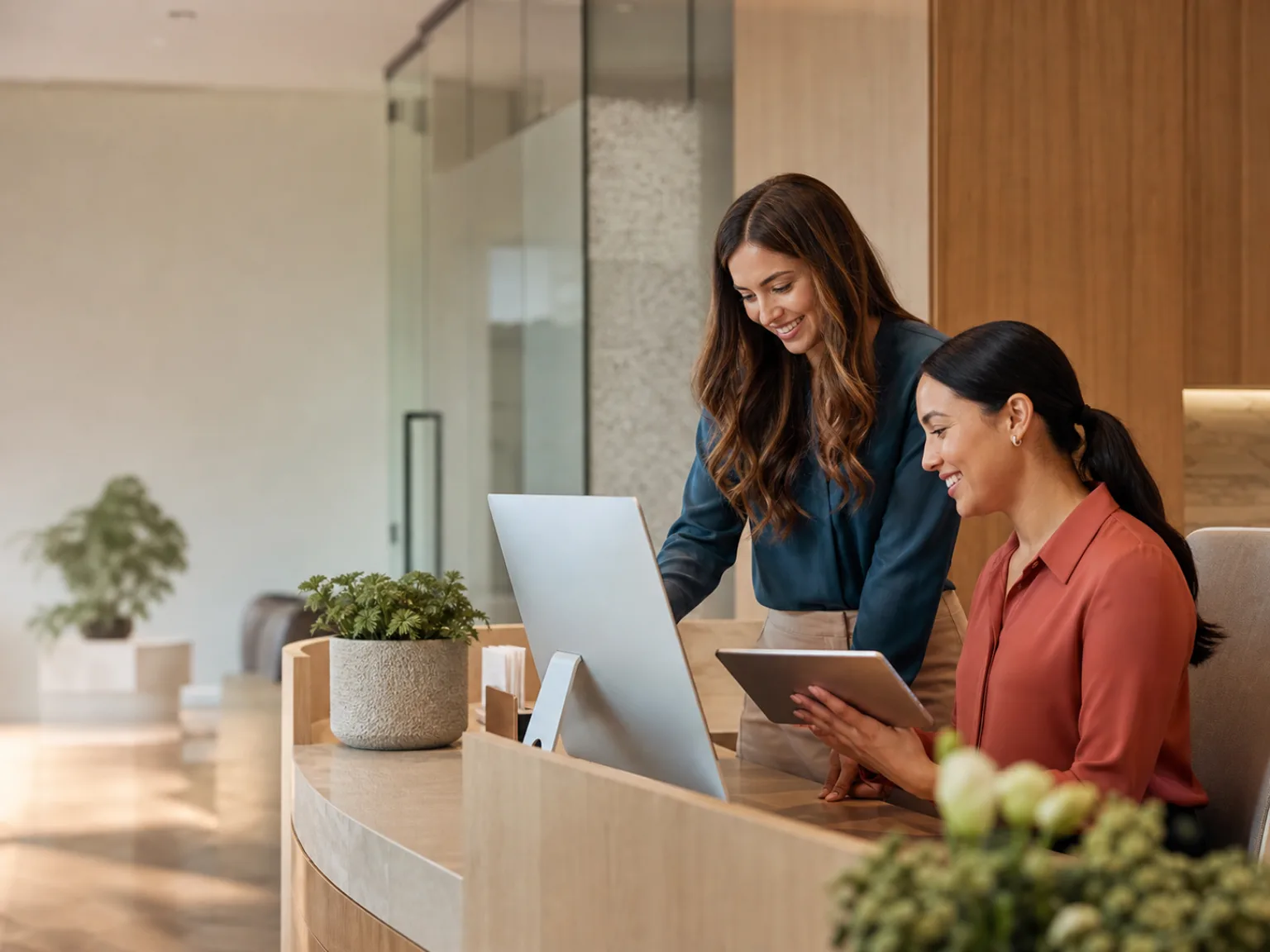 Dental front desk team coordinating patient follow-up